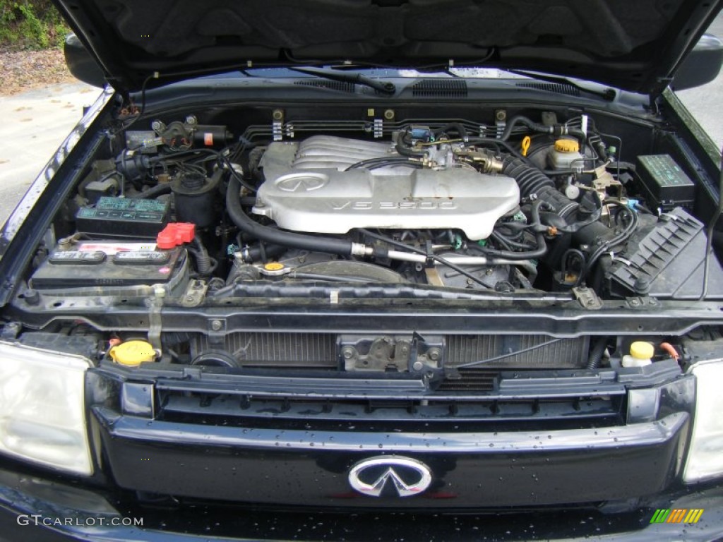 2001 QX4 4x4 - Black Obsidian / Stone Beige photo #17