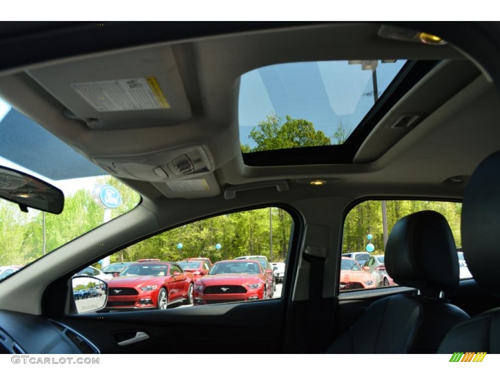 2013 Focus Titanium Sedan - Ruby Red / Charcoal Black photo #18