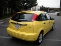 2002 Egg Yolk Yellow Ford Focus ZX5 Hatchback  photo #52