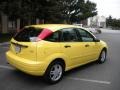 2002 Egg Yolk Yellow Ford Focus ZX5 Hatchback  photo #53