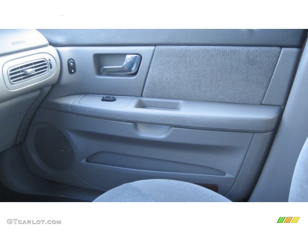 2002 Taurus SE - Matador Red Metallic / Medium Graphite photo #15