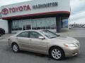 2009 Desert Sand Metallic Toyota Camry LE  photo #2