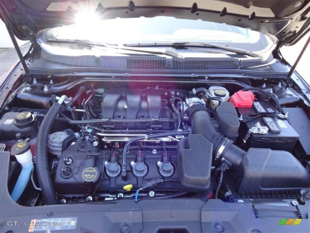 2015 Taurus SEL - Magnetic Metallic / Charcoal Black photo #9