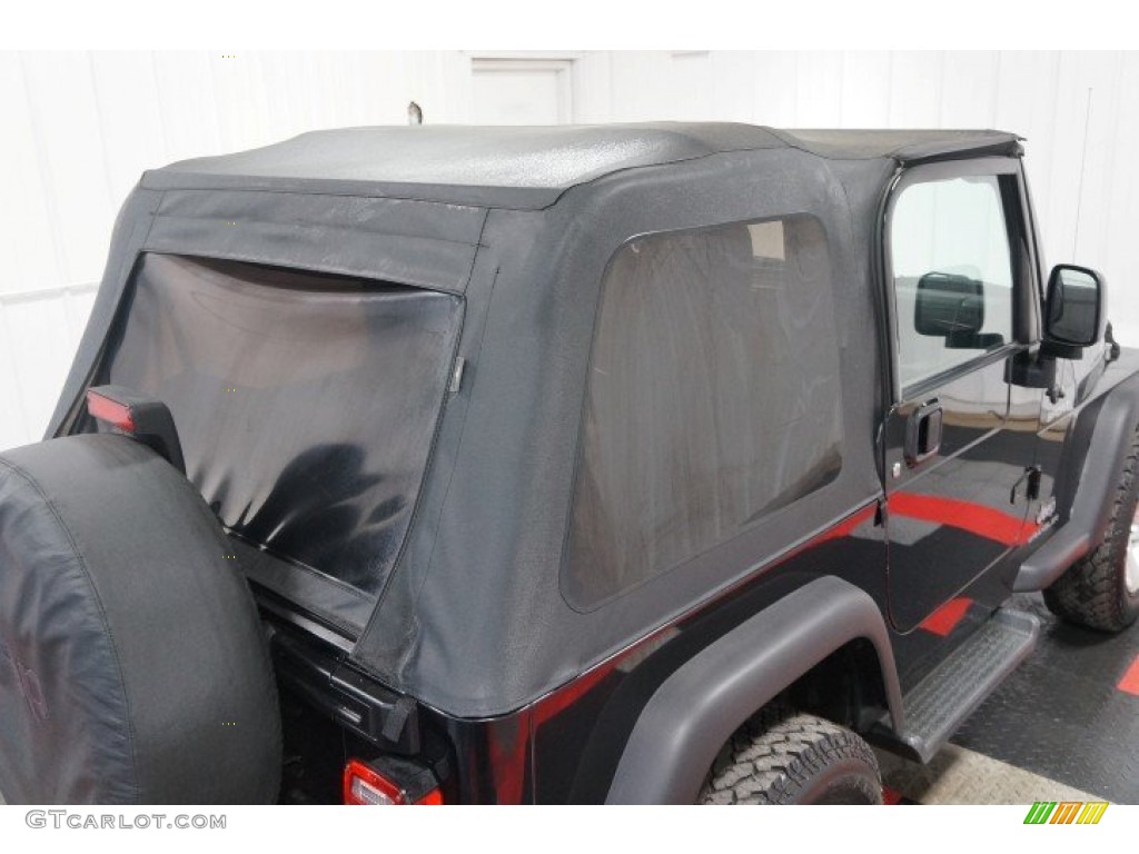 2004 Wrangler Sport 4x4 - Black / Dark Slate Gray photo #54