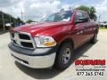 2012 Deep Molten Red Pearl Dodge Ram 1500 ST Quad Cab  photo #1