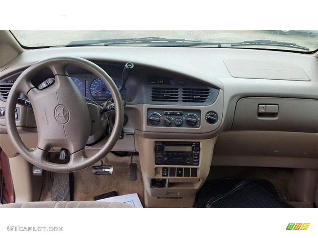 2002 Toyota Sienna LE Oak Dashboard Photo #103837483