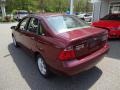 2007 Dark Toreador Red Metallic Ford Focus ZX4 SE Sedan  photo #5