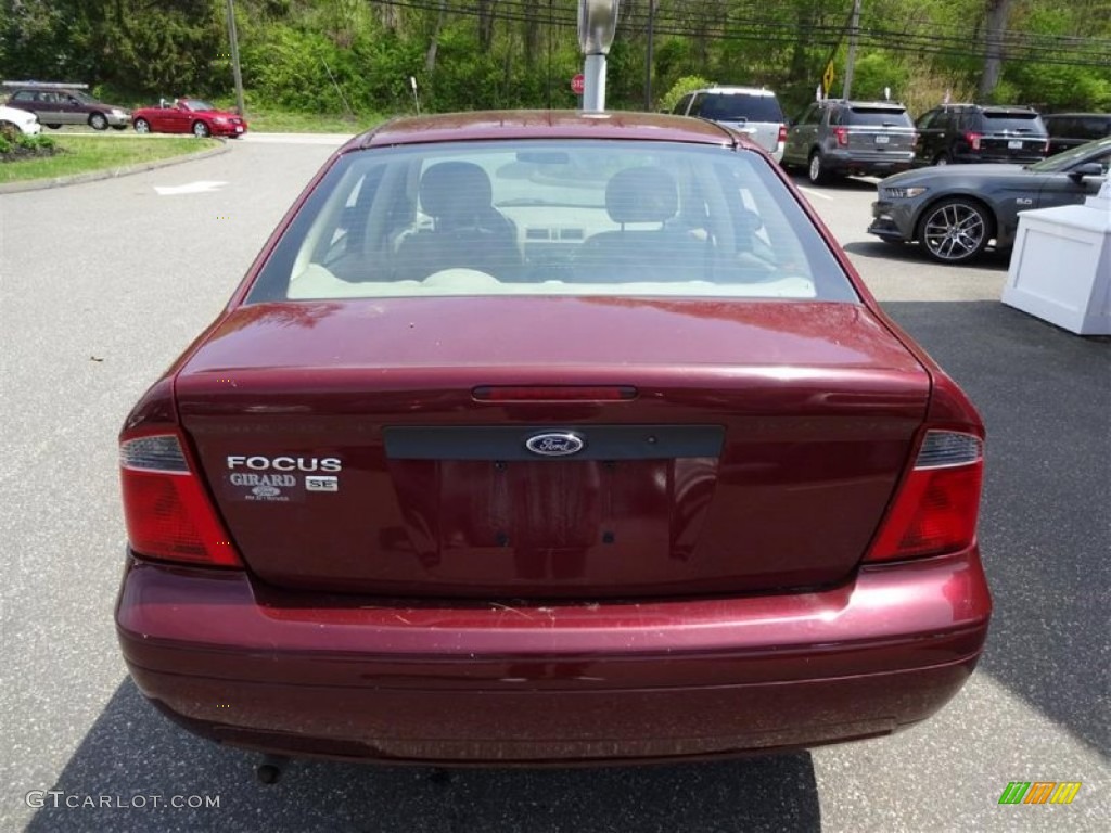 2007 Focus ZX4 SE Sedan - Dark Toreador Red Metallic / Dark Pebble/Light Pebble photo #6