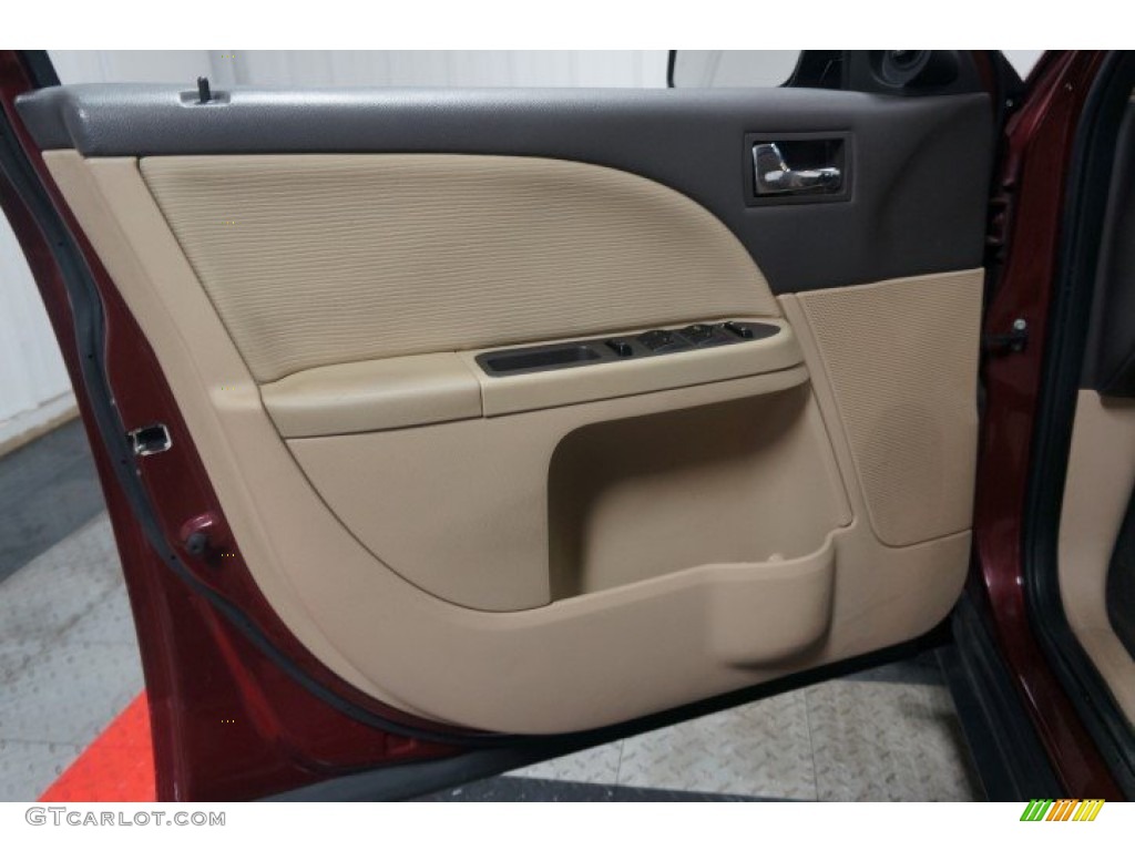 2008 Taurus SEL - Merlot Metallic / Camel photo #11