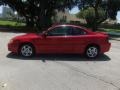 2003 Victory Red Pontiac Grand Am GT Coupe  photo #2