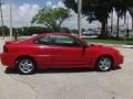 2003 Victory Red Pontiac Grand Am GT Coupe  photo #5