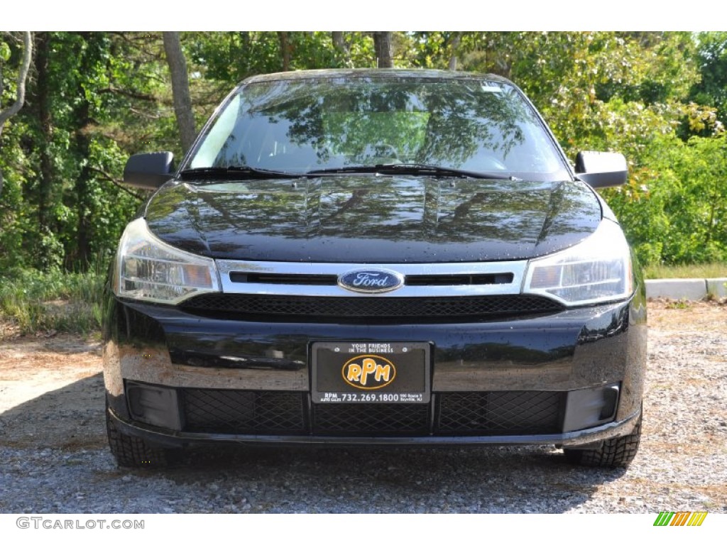 2009 Focus SE Sedan - Ebony Black / Medium Stone photo #2