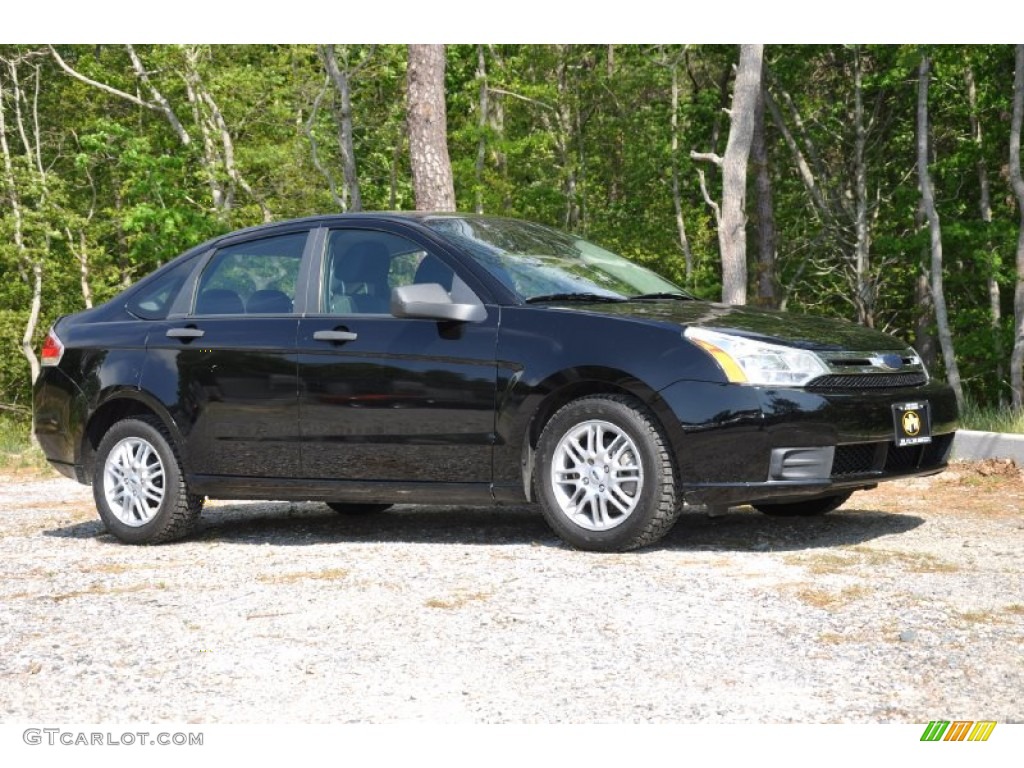 2009 Focus SE Sedan - Ebony Black / Medium Stone photo #9