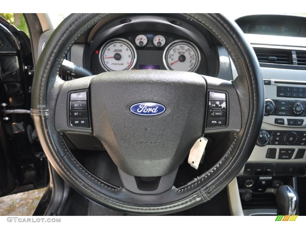 2009 Focus SE Sedan - Ebony Black / Medium Stone photo #20