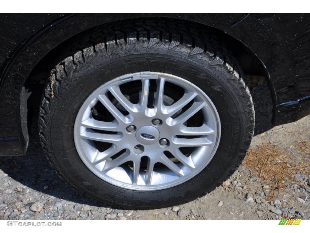 2009 Focus SE Sedan - Ebony Black / Medium Stone photo #26