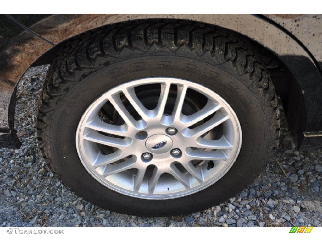2009 Focus SE Sedan - Ebony Black / Medium Stone photo #27
