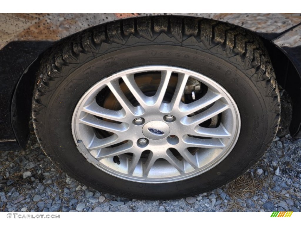 2009 Focus SE Sedan - Ebony Black / Medium Stone photo #28