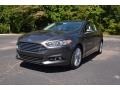 2016 Magnetic Metallic Ford Fusion SE  photo #1