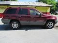 2002 Dark Garnet Red Pearlcoat Jeep Grand Cherokee Laredo  photo #2