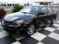 Labrador Black Pearl 2004 Mitsubishi Lancer OZ Rally