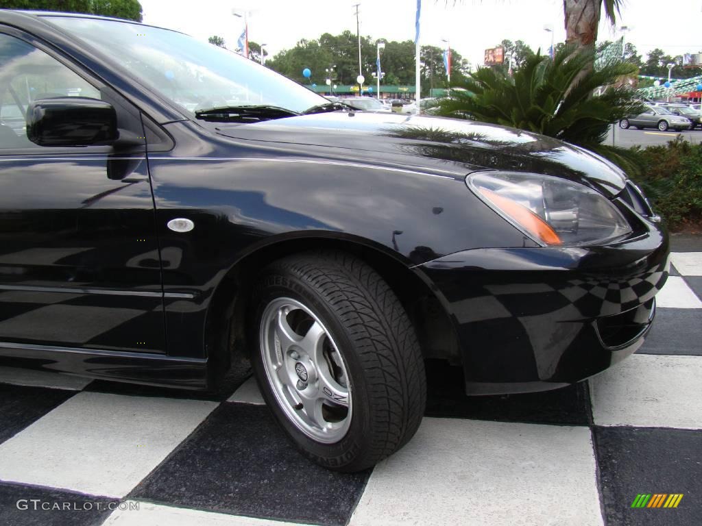 2004 Lancer OZ Rally - Labrador Black Pearl / Black photo #21