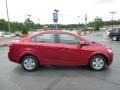 2013 Crystal Red Tintcoat Chevrolet Sonic LS Sedan  photo #6