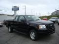 2006 Black Ford F150 STX SuperCab 4x4  photo #1