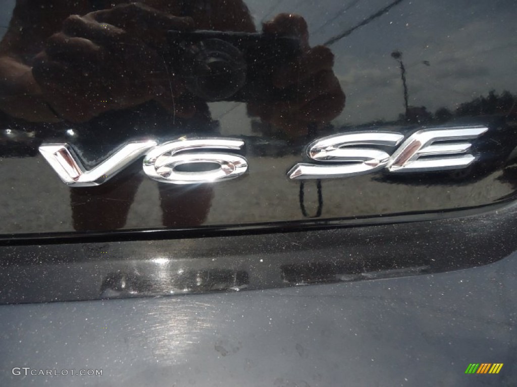2006 Solara SE V6 Coupe - Black / Dark Stone photo #10