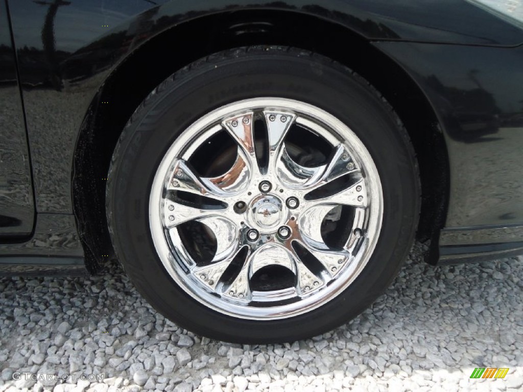 2006 Solara SE V6 Coupe - Black / Dark Stone photo #14