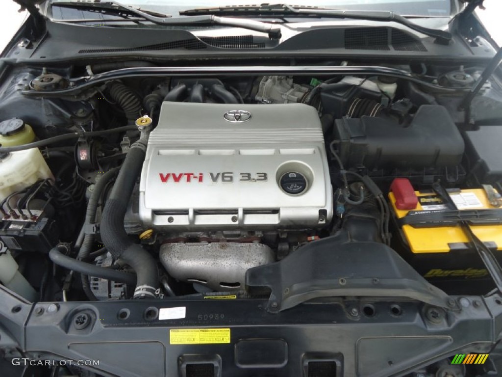 2006 Solara SE V6 Coupe - Black / Dark Stone photo #15