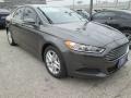 2016 Magnetic Metallic Ford Fusion SE  photo #1