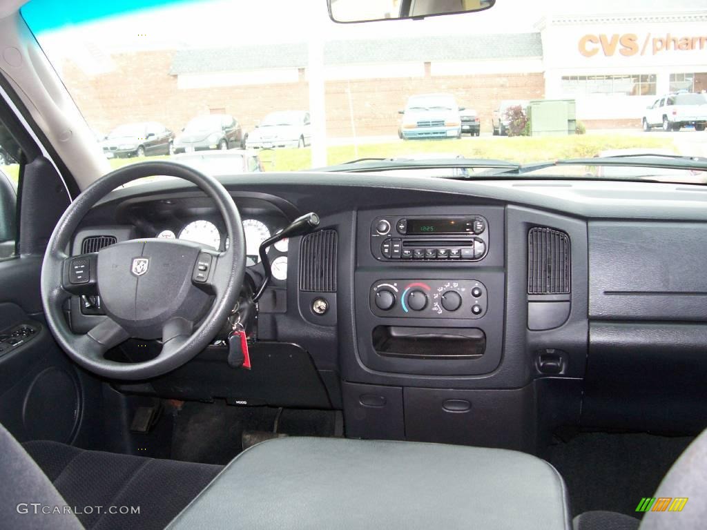 2005 Ram 1500 SLT Quad Cab 4x4 - Bright White / Dark Slate Gray photo #23