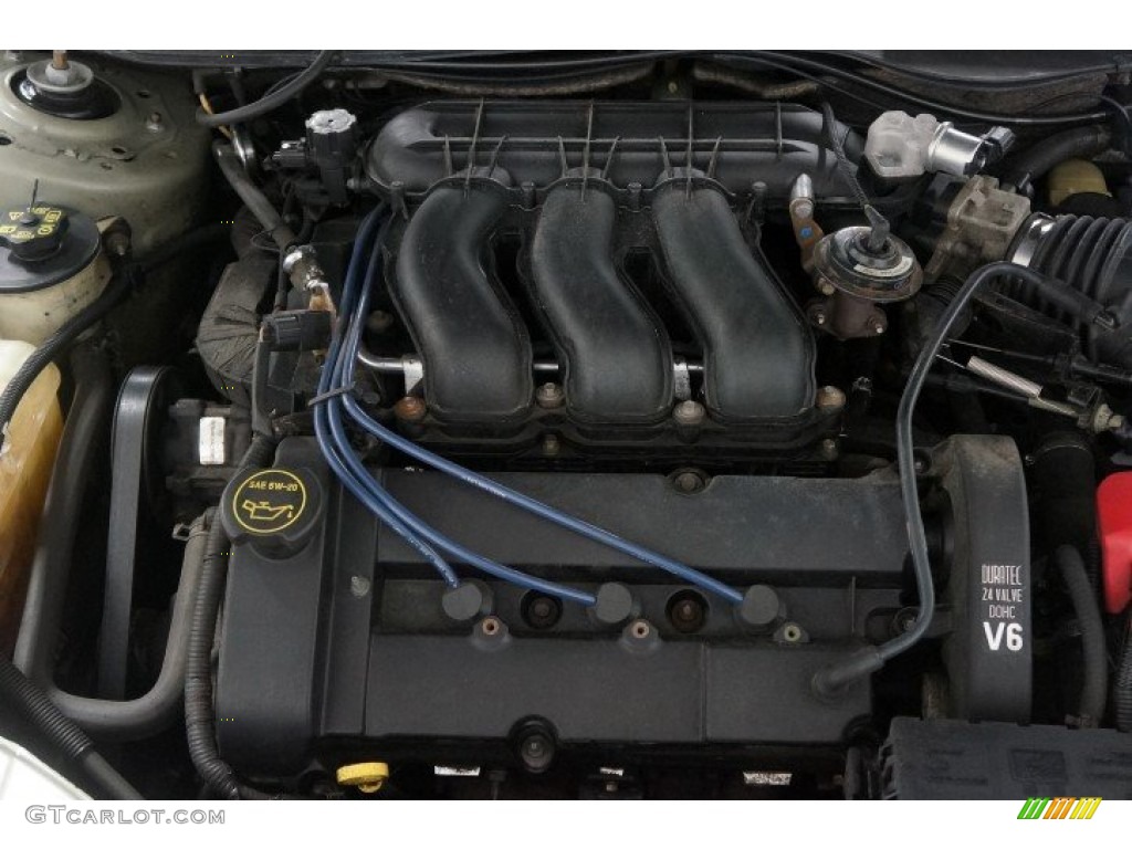 2002 Taurus SEL - Silver Frost Metallic / Medium Graphite photo #34