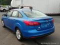 2015 Blue Candy Metallic Ford Focus SE Sedan  photo #3