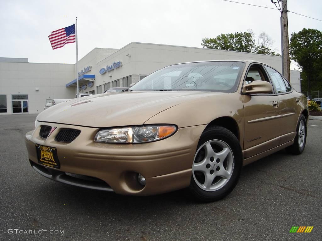 1998 Grand Prix GT Sedan - Gold Metallic / Camel photo #1