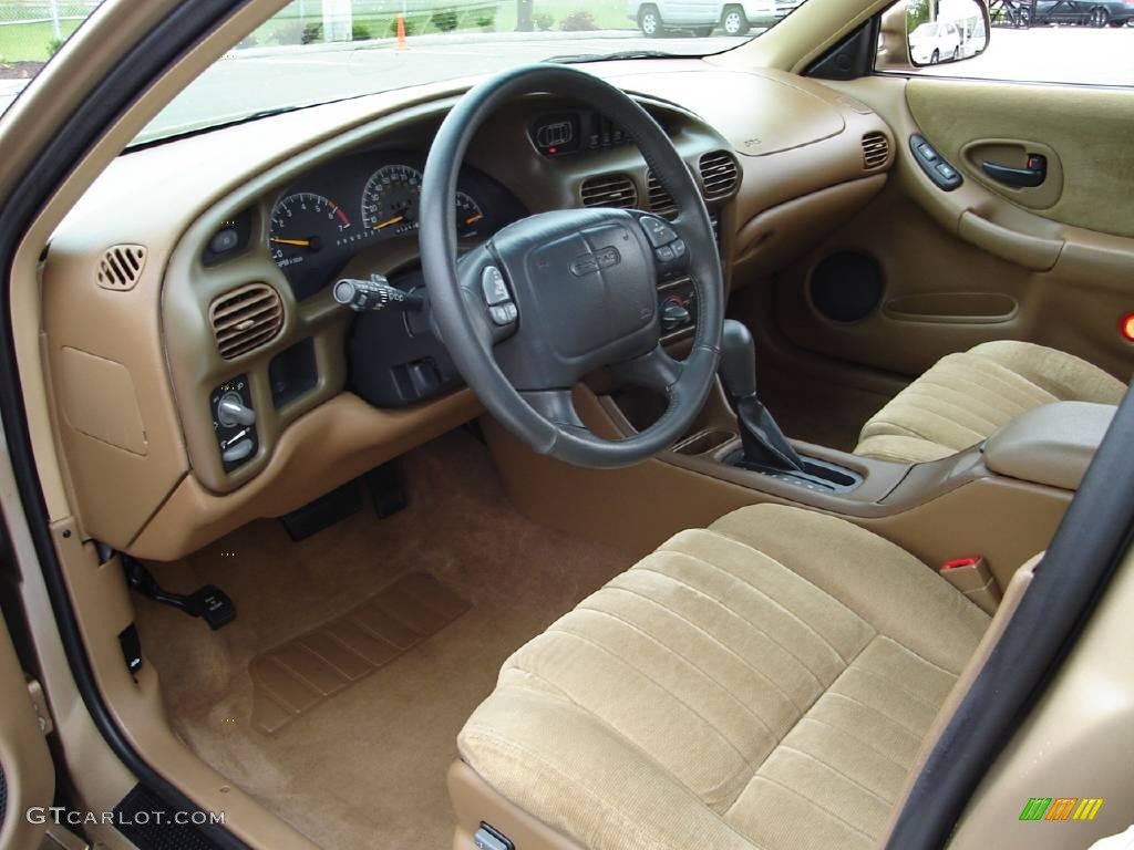 1998 Grand Prix GT Sedan - Gold Metallic / Camel photo #22
