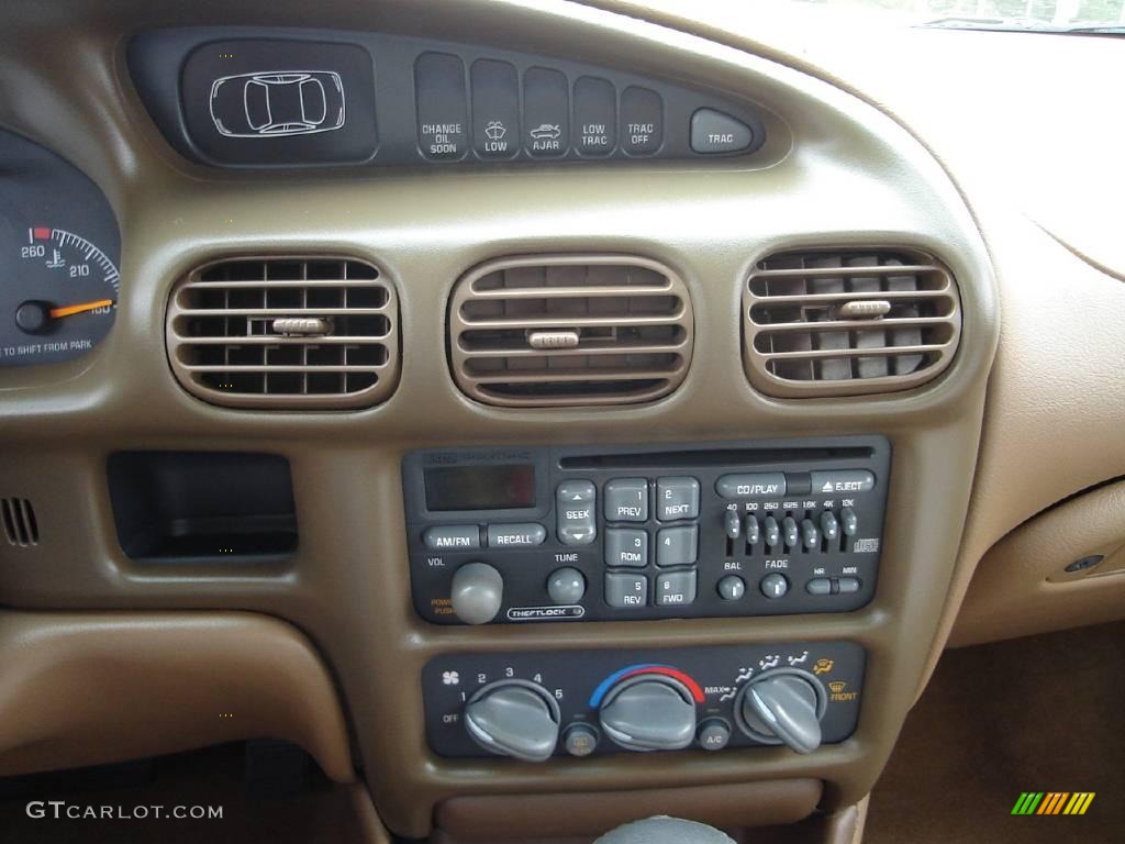 1998 Grand Prix GT Sedan - Gold Metallic / Camel photo #25