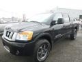Front 3/4 View of 2015 Titan PRO-4X Crew Cab 4x4