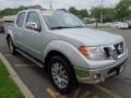 Front 3/4 View of 2010 Frontier LE Crew Cab 4x4