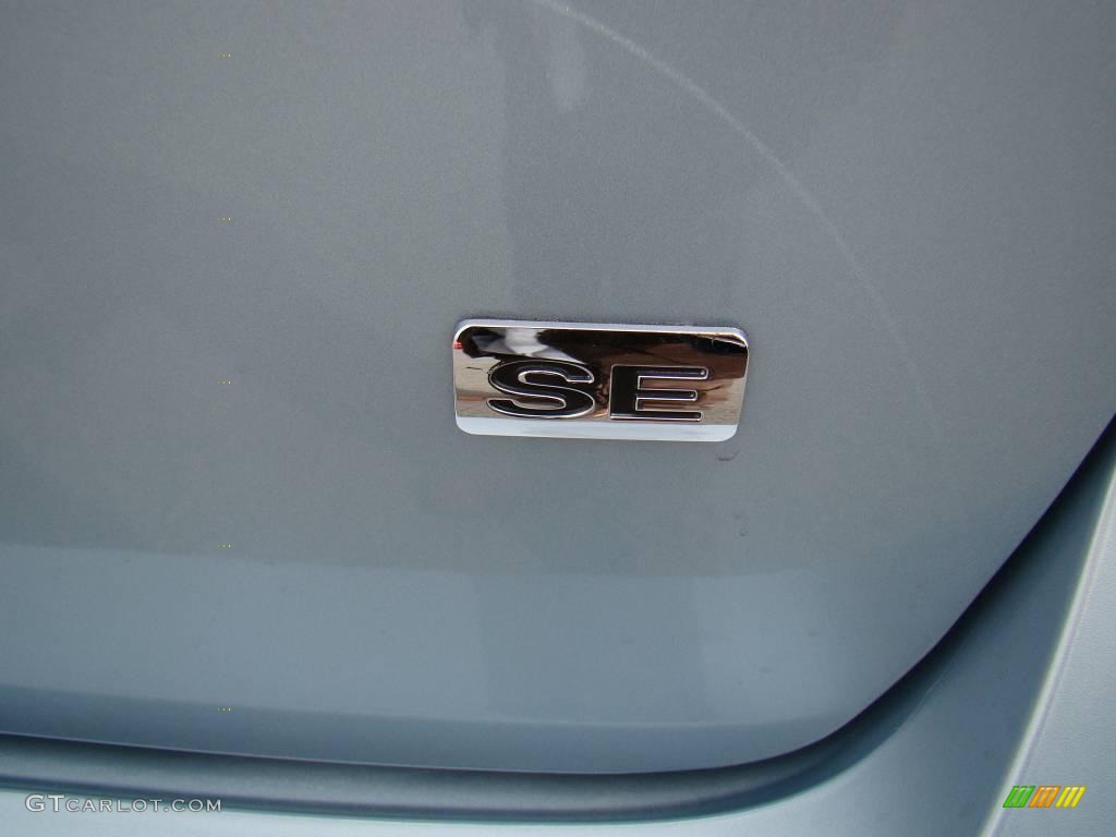 2009 Focus SE Sedan - Light Ice Blue Metallic / Medium Stone photo #15