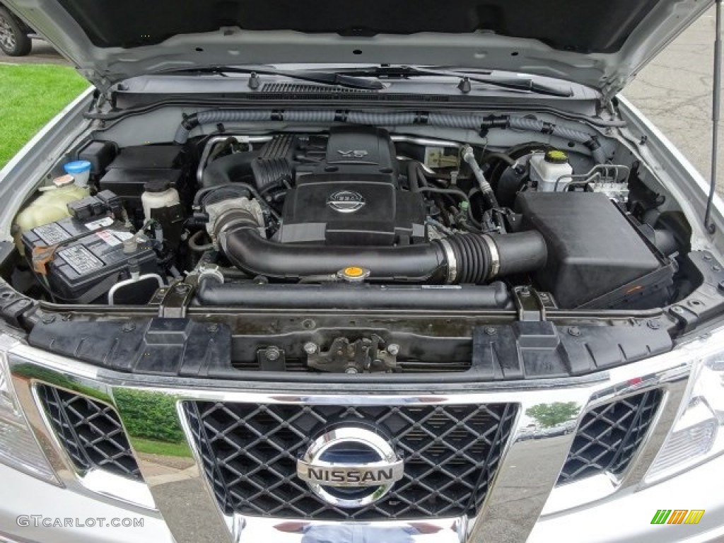 2010 Frontier LE Crew Cab 4x4 - Radiant Silver Metallic / Steel photo #24