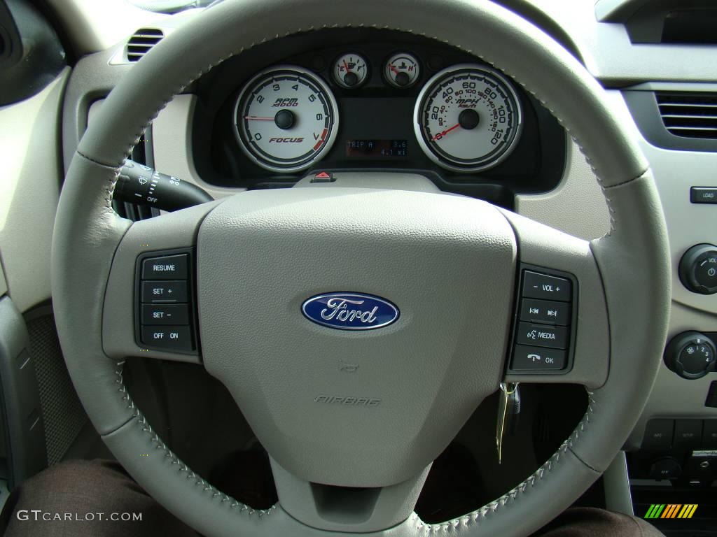 2009 Focus SE Sedan - Light Ice Blue Metallic / Medium Stone photo #21