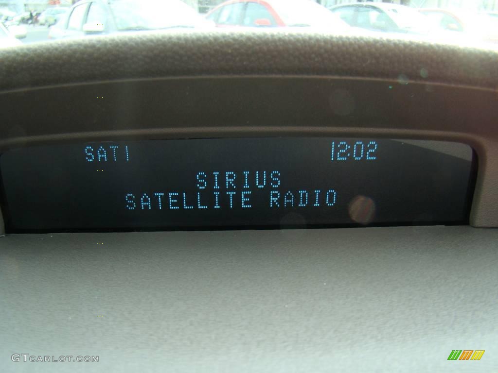 2009 Focus SE Sedan - Light Ice Blue Metallic / Medium Stone photo #22