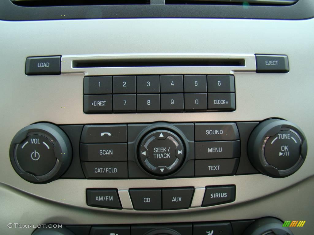 2009 Focus SE Sedan - Light Ice Blue Metallic / Medium Stone photo #23