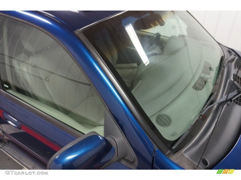 2004 Rainier CXL AWD - Indigo Blue Metallic / Light Cashmere photo #77