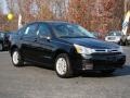 2009 Ebony Black Ford Focus SE Sedan  photo #1