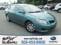 2010 Capri Sea Metallic Toyota Corolla LE #105698818