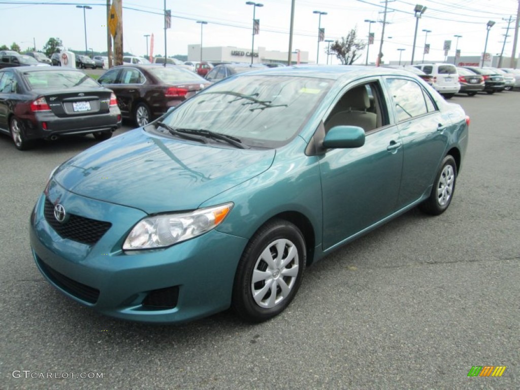 Capri Sea Metallic 2010 Toyota Corolla LE Exterior Photo #105704785