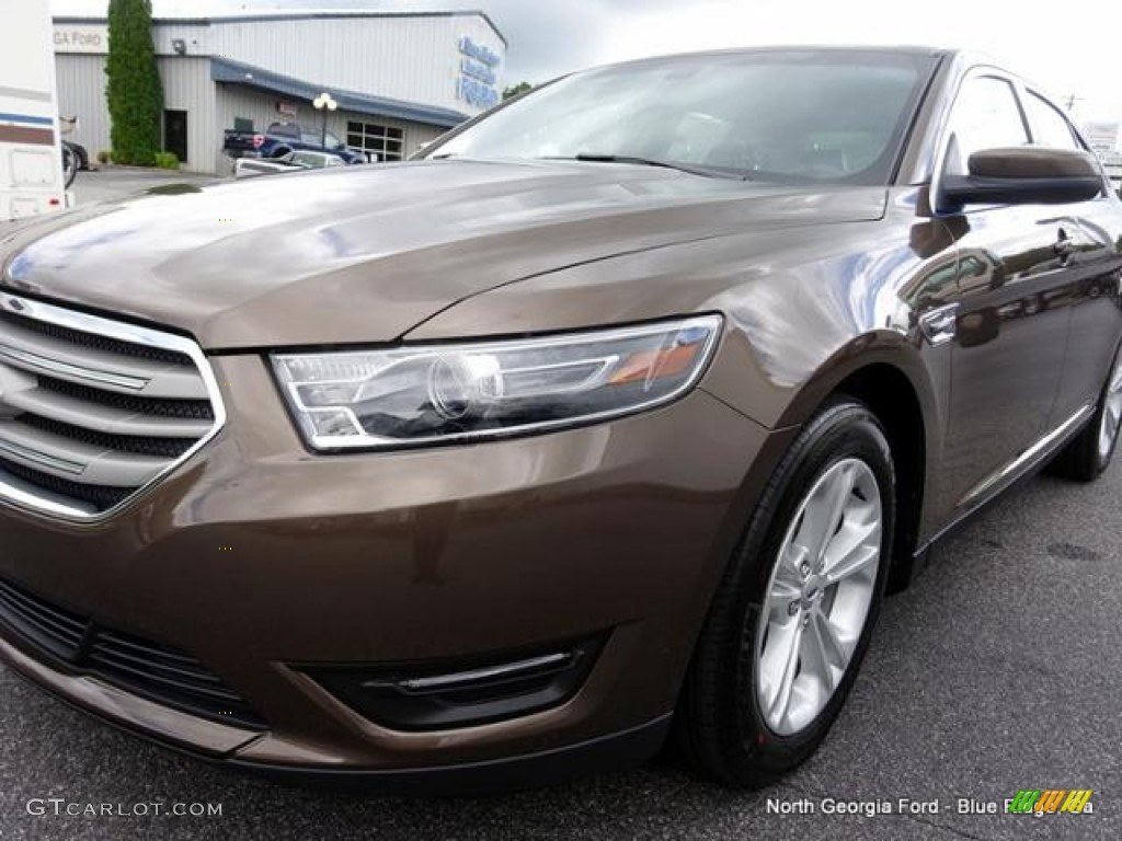 2015 Taurus SEL - Caribou Metallic / Charcoal Black photo #32