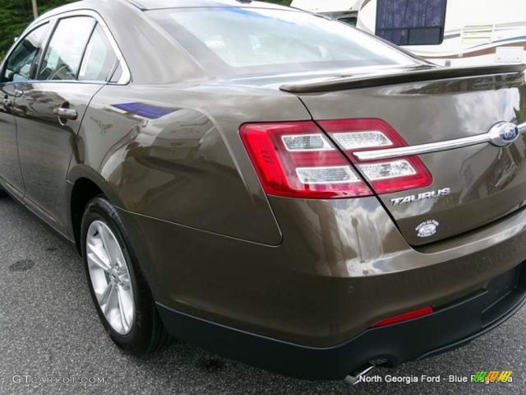 2015 Taurus SEL - Caribou Metallic / Charcoal Black photo #35